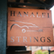 Shop 2 Hanalei Strings shop sign
