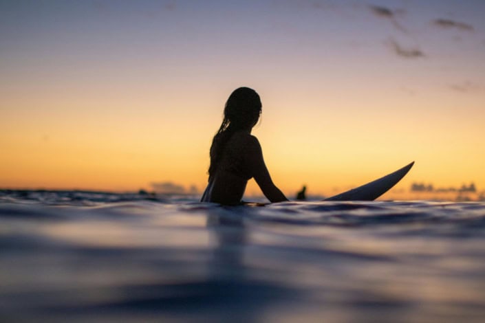 Surfer on board waiting for a wave